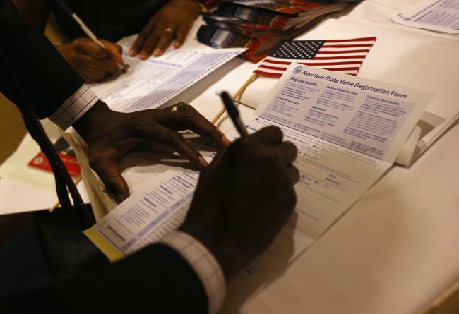 New American citizens register to vote 