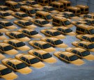 Taxis sit in a flooded lot after Hurricane Sandy October 30, 2012 in Hoboken, New Jersey.