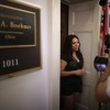 Reporters interview an undocumented immigrant outside the locked offices of Speaker John Boehner (R-OH) with other members from the immigrant youth-led organization United We Dream as they demonstrate against lawmakers who do not support an end to deporta