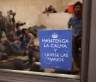 Undocumented immigrants wait in a holding cell at a U.S. Border Patrol processing center for people detained near the U.S.-Mexico border on September 8, 2014 in McAllen, Texas