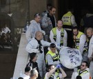 Bodies Being Removed from Jerusalem Synagogue