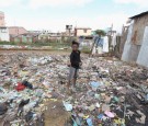 A child stands in the slums of Antananarivo, the capital city of Madagascar