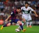 Barcelona's Lionel Messi & Elche's Sergio Pelegrin