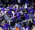 Kansas State Fans Rush the court after beating Kansas Jayhawks