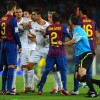 Real Madrid's Cristiano Ronaldo arguing with Barcelona Players