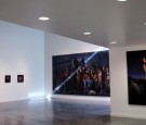 The work of Rigoberto A. Gonzalez hangs in the gallery of the Latino Cultural Center in Dallas.