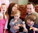 Anna and Josh Duggar with their children