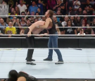 Dean Ambrose delivers Dirty Deeds to Kane during 