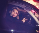 Snapshot of Miley taken while driving down LA's Sunset Boulevard 