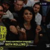 Seth Rollins next to NXT Diva Zahra Schreiber