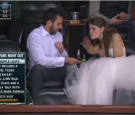 Bride Eating Burger in Wedding Dress at Hockey Game makes Internet Smile