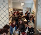 Women Shoppers Waiting in a Line at the Cashier