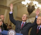 Sen. Charles Schumer (D-NY) (C) answers reporters' questions duirng a news conference with (L-R) Sen. Patty Murray (D-WA), Senate Minority Whip Richard Durbin (D-IL) and Senate Minority Leader Harry Reid (D-NV) senate