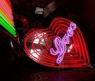 Workers Make And Renovate Neon Signs