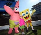 Nickelodeon characters pose with a fan