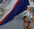  American Samoa's flag bearer parades in front of her delegation during the 2008 Beijing Olympic Games opening ceremony on August 8, 2008 at the National Stadium in Beijing