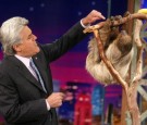 Jay Leno interacts with a sloth