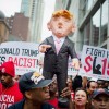 Activists Protest For Immigration Reform And Fair Wages At Trump Tower In Chicago